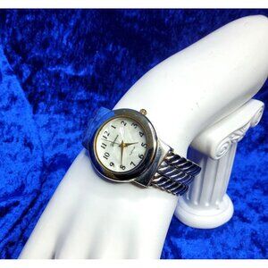 vintage geneva platinum womens silver tone spring band watch